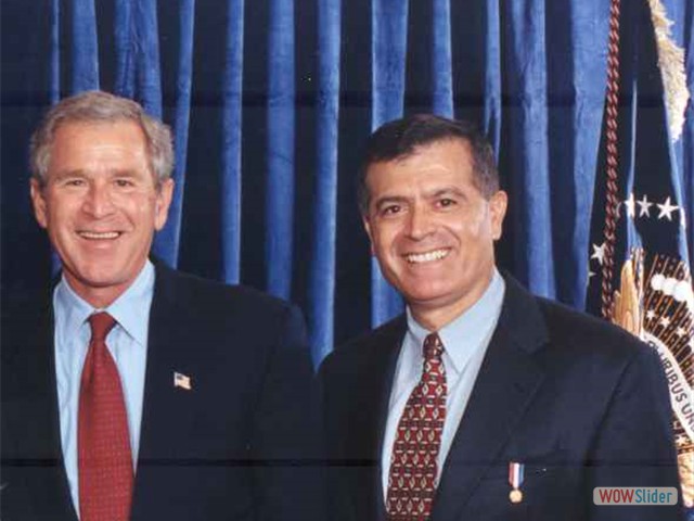 Mr Peter Kilissanly and President Bush
